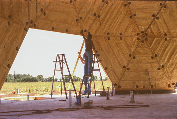90 triangles being assembled into a dome
