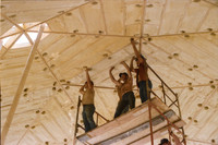 Tightening the bolts on the final triangle