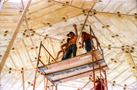 Tightening the bolts on the final triangle