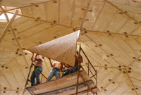 Final HEAVY triangle (about 10' on a side) being put in place 27' up